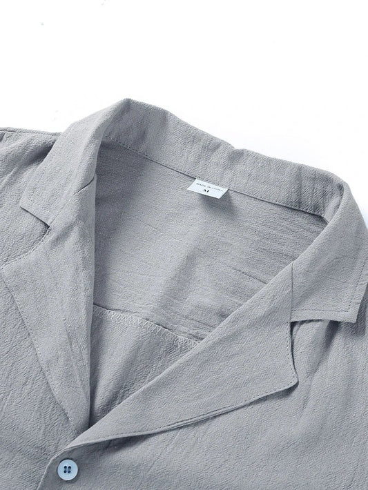 Men's casual beach shirt by MANDOTOS, short sleeve button-down style, lightweight fabric ideal for summer beachwear.