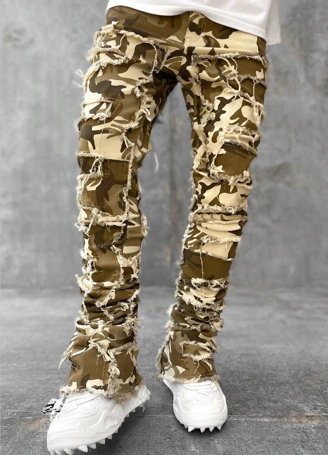 Men's stacked jeans by MANDOTOS featuring patched design and long tight fit for bold, stylish casual wear.