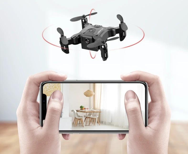 Mini folding drone from MANDOTOS with compact design and propellers, suitable for aerial photography and indoor flying.