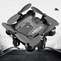 Mini folding drone by MANDOTOS, compact quadcopter with foldable arms, lightweight design, and remote control for aerial photography.