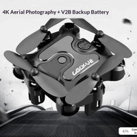 Mini folding drone by MANDOTOS with compact design, four propellers, and remote control, suitable for easy outdoor flying.