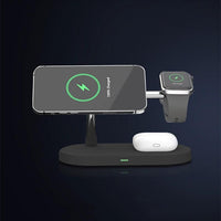 Mandotos multifunctional 5-in-1 magnetic wireless charger with phone, watch, headset holder and 15W fast charging on a desktop.
