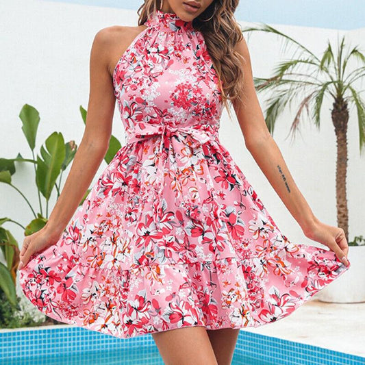 Mandotos floral print halterneck summer dress with ruffles and lace-up detail, perfect for women’s stylish warm-weather wear.