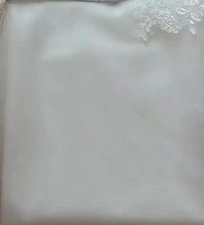 White Princess Bride mermaid wedding dress by MANDOTOS featuring backless lace design with trailing train.