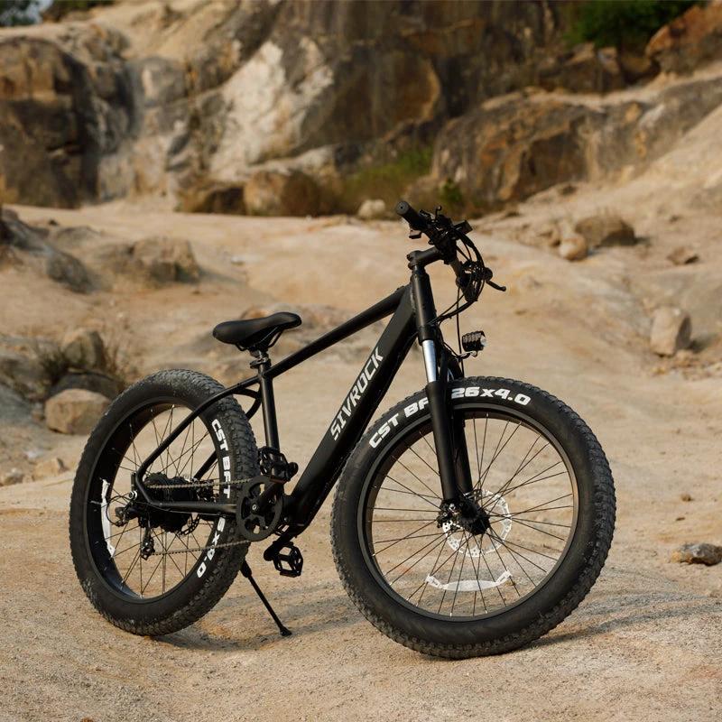 Mandotos electric mountain bike for adults with 26x4-inch fat tires, 1000W motor, 48V 15Ah battery, suitable for trail riding and commuting.