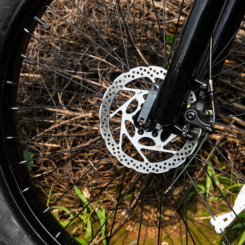 Mandotos electric mountain bike for adults with 26x4-inch fat tires, 1000W motor, 48V 15Ah battery, suitable for trail riding and commuting.
