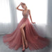 Elegant black prom dress by MANDOTOS featuring a fitted bodice and flowing skirt, perfect for formal events and dances.