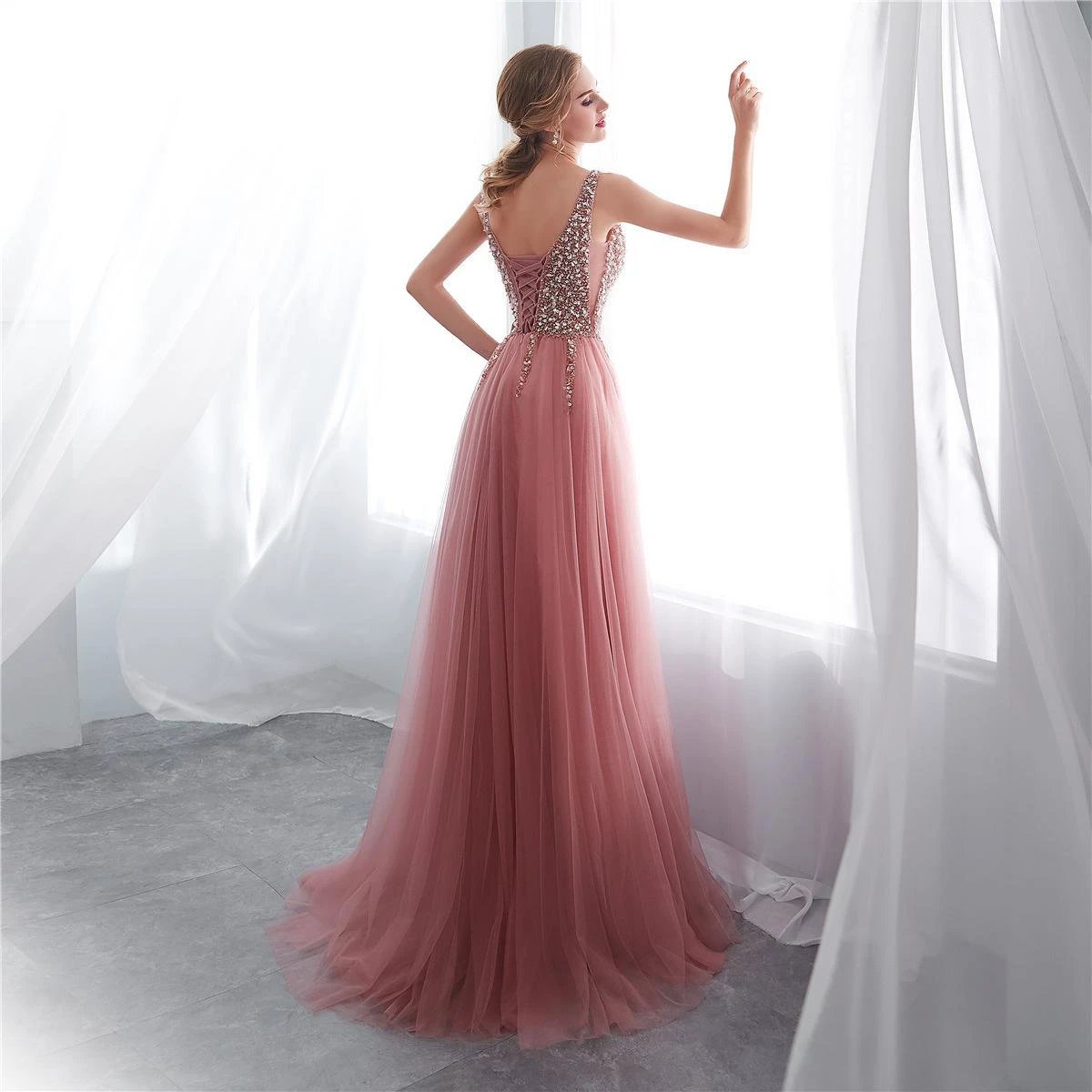 Elegant MANDOTOS prom dress with a flowing design, perfect for formal events and special occasions.