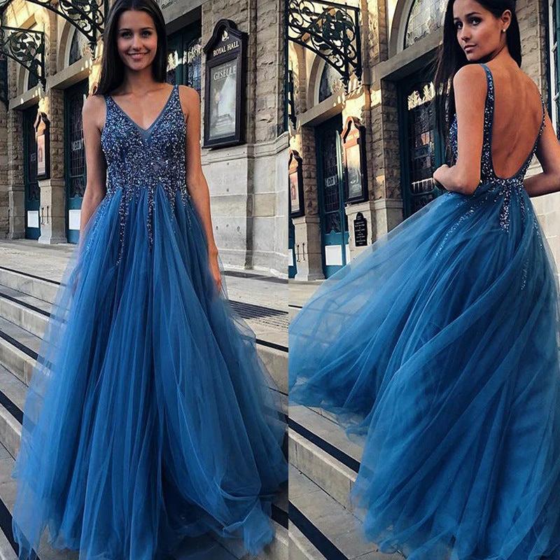Elegant MANDOTOS prom dress in vibrant color, featuring a flowing silhouette and intricate details for formal occasions.