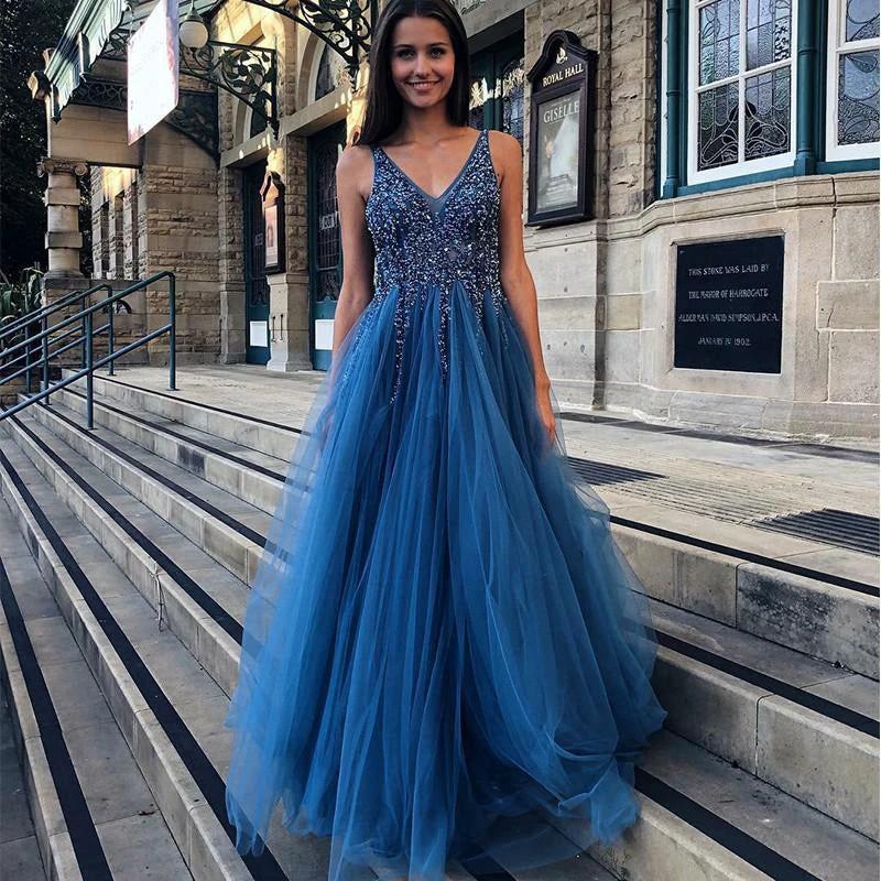 Elegant black prom dress by MANDOTOS featuring a fitted bodice and flowing skirt, perfect for formal evening events.