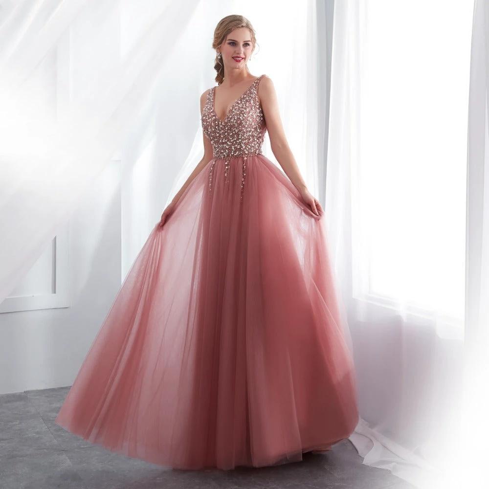 Elegant MANDOTOS prom dress in black with intricate lace details, sleeveless design, and fitted silhouette for formal occasions.