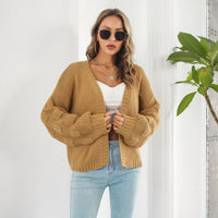 Mandotos women's puff sleeve cardigan sweater with chunky knit texture and front coat style, stylish and cozy for casual wear.