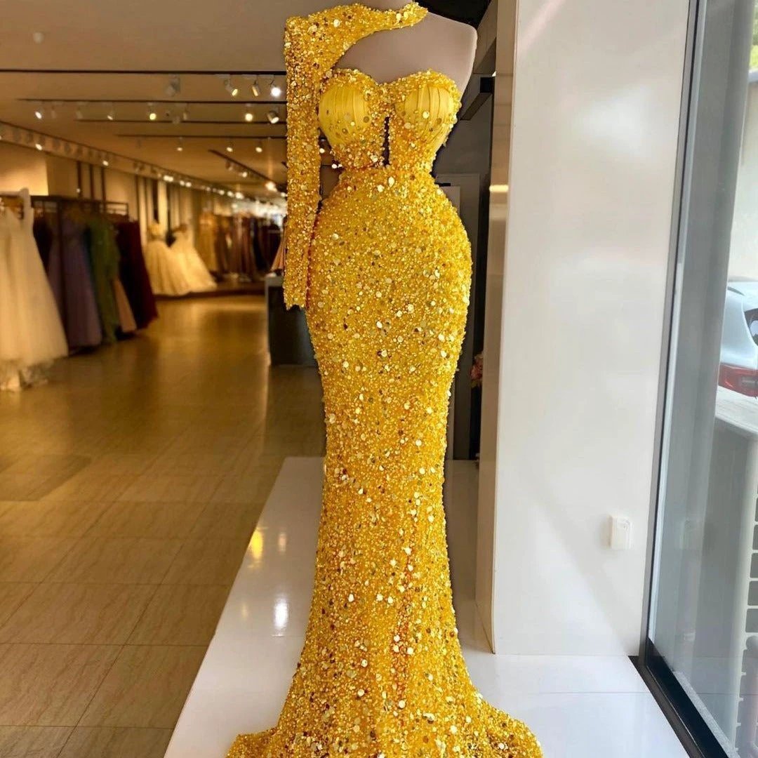 Mandotos sequined pear-shaped dress with embroidery lace, asymmetric design, and single sleeve for elegant evening wear.