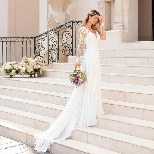 White backless deep V-neck wedding dress for women by MANDOTOS, elegant evening dress with a sexy, flowing silhouette.