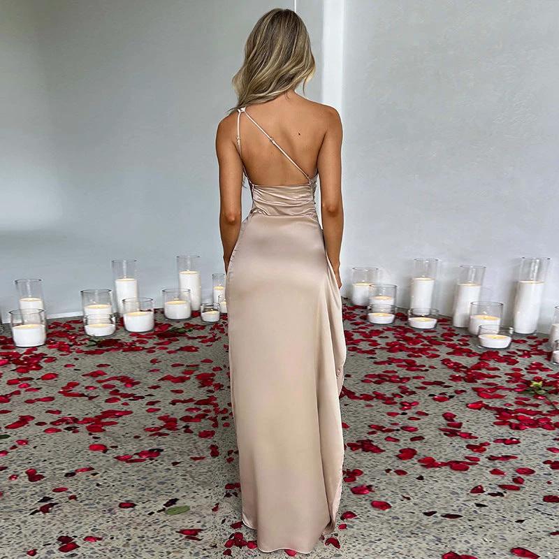 Elegant black one-shoulder backless satin dress with slit, slim-fit design, perfect for summer occasions, by MANDOTOS.