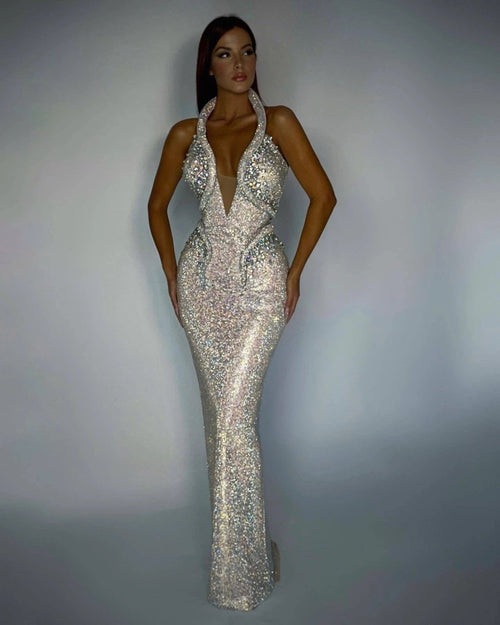Mandotos sexy sequined banquet dress with sheath silhouette and trailing hem, perfect for elegant evening events.
