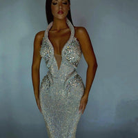 Mandotos sexy sequined banquet dress, sheath style with trailing design, perfect for evening events, shown in the image.