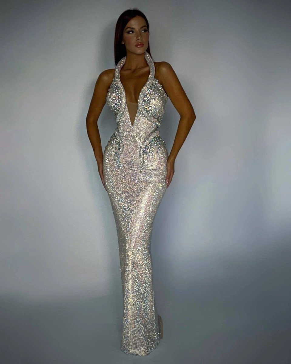 Mandotos sexy sequined banquet dress with sheath silhouette and trailing hem, designed for elegant evening occasions.