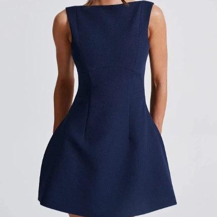 Mandotos sexy slim-fitting backless summer sleeveless short dress displayed on a model, highlighting its stylish design.