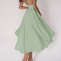 Mandotos women's sexy V-neck suspender summer dress with A-line long design, stylish and fashionable for warm weather.