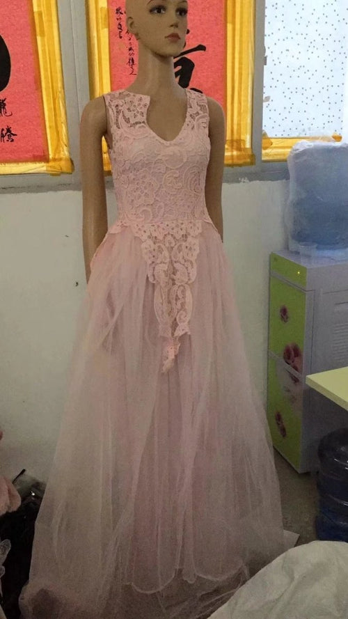 Mandotos sleeveless floral lace wedding dress with flower appliqués, romantic bridal gown featuring intricate lace details.