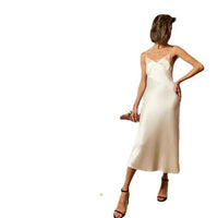 Long swing skirt with sling style and collage stitching in sweet plain pattern, made of polyester fiber by MANDOTOS.