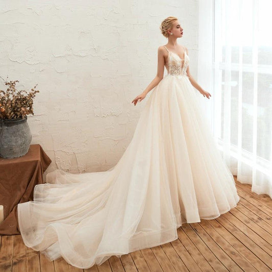 Mandotos Starry Sky Luxury Wedding Dress with IG Tail, thin and bareback design, featuring a dreamy starry sky pattern.