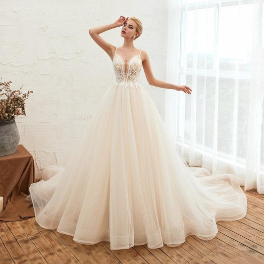 Elegant Starry Sky Luxury wedding dress by MANDOTOS featuring a thin, beakless design and dream-like silhouette.