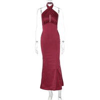 Elegant backless sleeveless summer dress by MANDOTOS, showcasing lightweight fabric and stylish design perfect for warm weather.