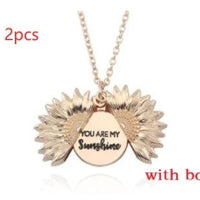 Mandotos sunflower double lettering necklace featuring gold chain and sunflower charms, perfect for stylish everyday wear.