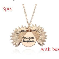Mandotos sunflower double lettering necklace with gold chain and sunflower pendant, stylish jewelry for casual or elegant wear.