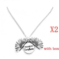 Mandotos sunflower double lettering necklace with gold chain and sunflower pendant, stylish jewelry accessory.