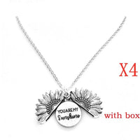 Mandotos sunflower double lettering necklace with gold chain and pendant featuring a sunflower design and custom initials.