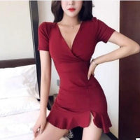 Mandotos V-neck bag hip high waist slimming fish tail dress displayed on a model, showcasing elegant fit and stylish design.