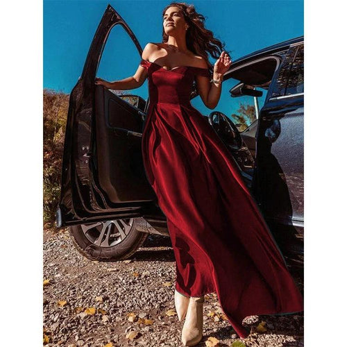 Mandotos V-neck solid color long vintage gown dress displayed on a hanger, showcasing its elegant flowing fabric and classic design.