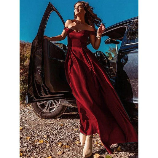 Mandotos V-neck solid color long vintage gown dress displayed on a hanger, showcasing its elegant flowing fabric and classic design.