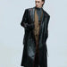 Mandotos wide shoulder fur coat with metal belt, long cut design, featuring a stylish and modern silhouette.