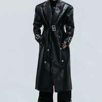 Mandotos wide shoulder fur coat with metal belt, long-cut design, featuring a stylish and warm winter outerwear look.