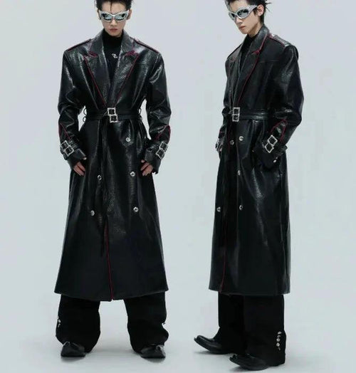 Mandotos wide shoulder fur coat with metal belt and long cut, featuring a stylish, warm design for winter wear.