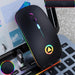Mandotos wireless charging Bluetooth mouse with sleek design, visible buttons, and charging pad in use on a desk.