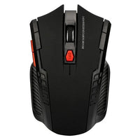 Mandotos wireless mouse with ergonomic design, black body, and scroll wheel for smooth navigation on a desk.