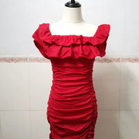 Women’s black off-shoulder ruched layered ruffles bodycon dress by MANDOTOS, shown on a model with a fitted silhouette and elegant ruffle details.