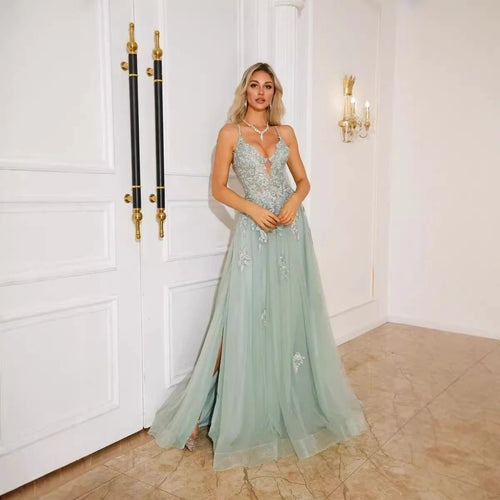 Long women’s evening dress with suspenders by MANDOTOS, elegant dance dress for formal occasions.