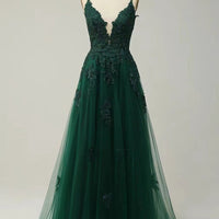 Long women’s evening dress by MANDOTOS with suspender straps, elegant design for formal dances or special occasions.