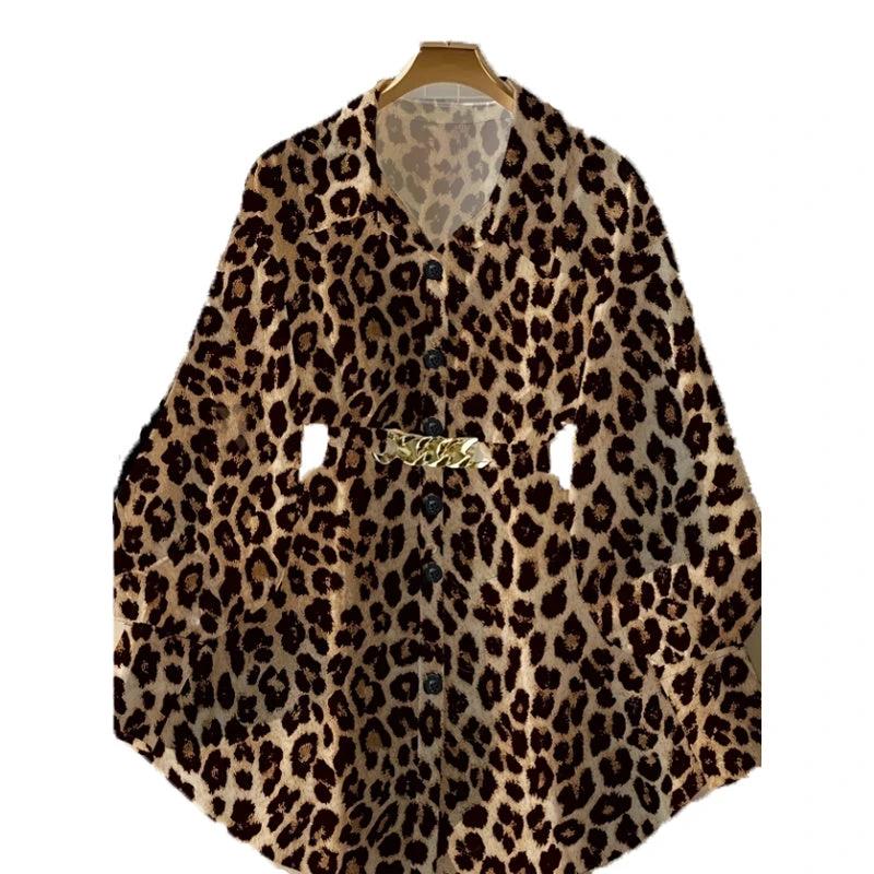 Women's elegant lapel button-down blouse with adjustable metal waist belt, solid color, loose fit, suitable for casual or office wear.