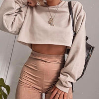 Women's long sleeve crop top t-shirt by MANDOTOS, featuring a fitted design and soft fabric, shown in a casual style.