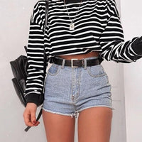 Women's long sleeve crop top t-shirt by MANDOTOS, featuring a fitted design and soft fabric, shown in a stylish, casual look.