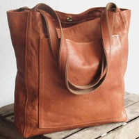 Women's soft leather shoulder bag with pocket, vintage style by MANDOTOS, featuring a portable design and classic craftsmanship.