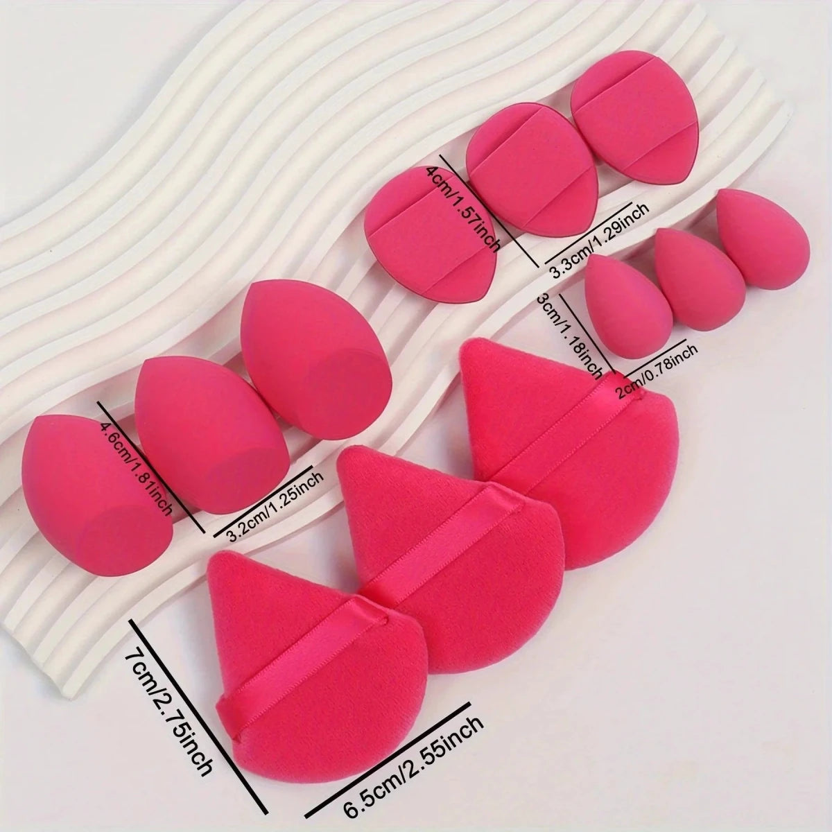 Mandotos 12-piece all-purpose makeup sponge set with loose powder puffs, beauty eggs, mini air cushion and mini sponges for flawless application.