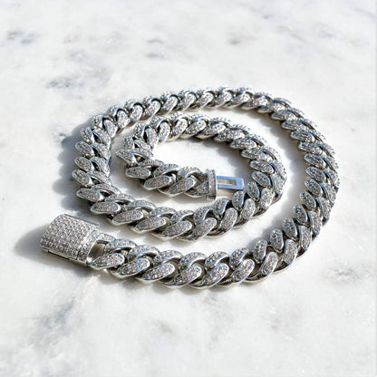 12mm white gold diamond Cuban link bracelet by Mandotos featuring sparkling diamonds and a bold, luxurious design.